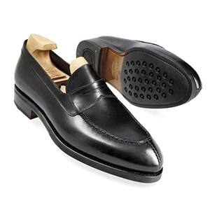 PENNY LOAFERS IN BLACK RUSTICALF | CARMINA